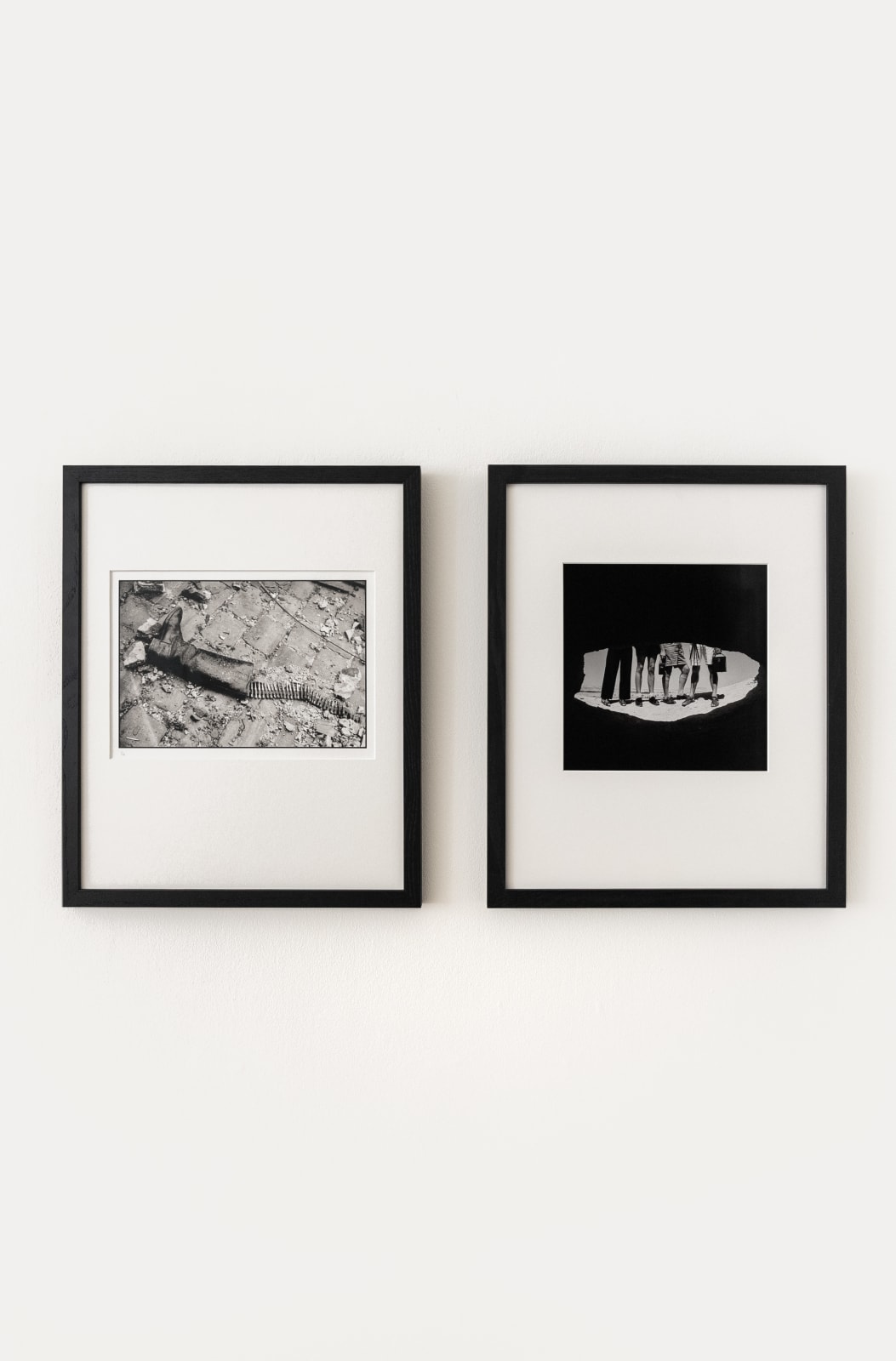 Lee Miller, Debris on pavement outside, [Boot and ammunition], St Malo, France, 1944