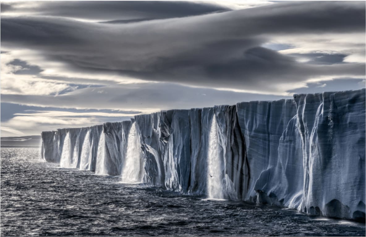 Paul Nicklen, Ice waterfall Svalbard, Norway