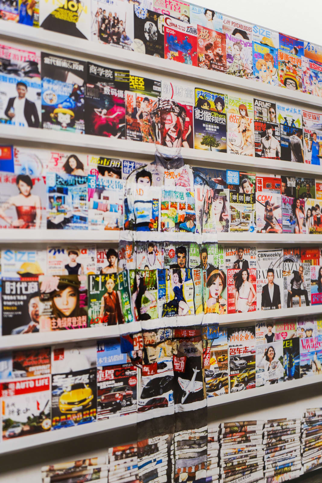 Liu Bolin, Hiding in the City: Beijing Magazine Rack, 2011