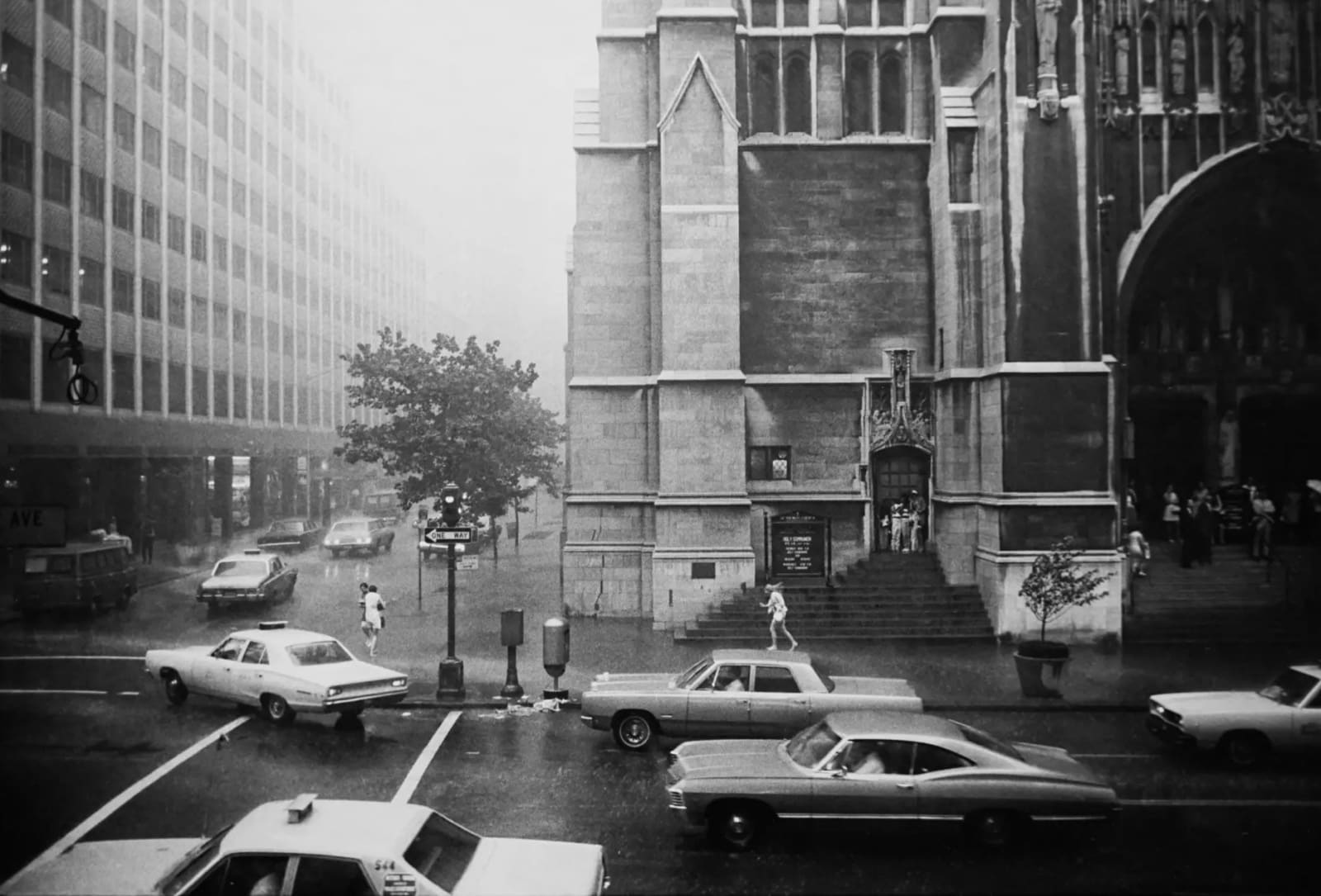 Garry Winogrand, 5th Ave and 54th St. In The Rain, New York, 1968