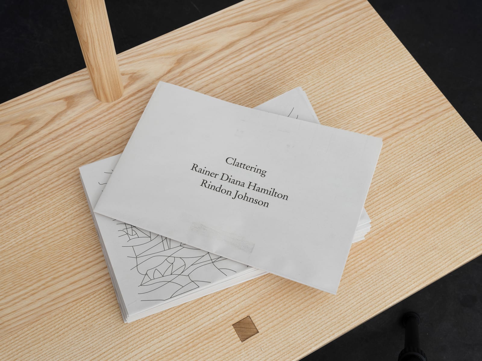 Newspaper style publication of the novella Clattering on a bench made of ash wood Rindon Johnson Clattering, 2021 Stained glass work (3 panels) and ash wood bench Glass work: 360 x 158 cm 141 3/4 x 62 1/4 inches Bench: 200 x 49 x 80 cm 78 3/4 x 19 1/4 x 31 1/2 inches