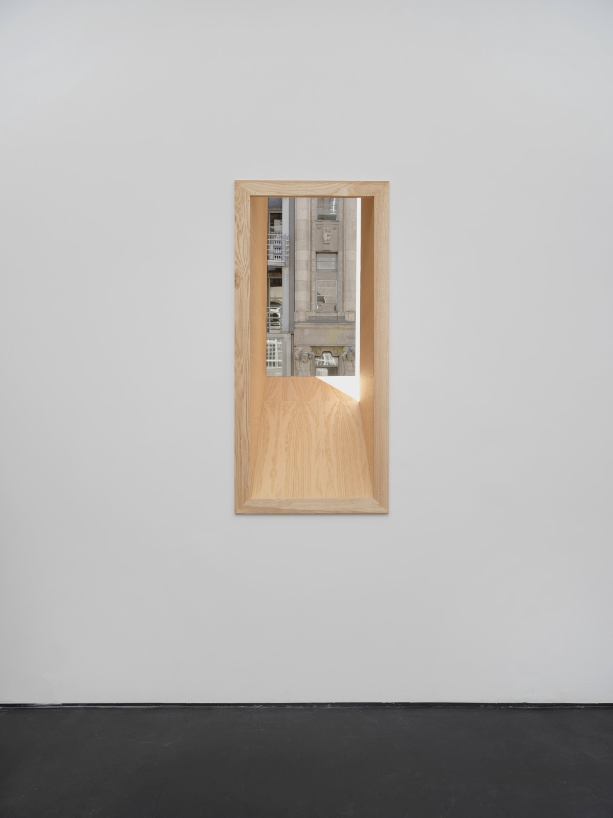 Parallelogram ash-coloured wooden window frame on white wall and view of grey building across. Rindon Johnson Examples: laughter in the morning and tears in the afternoon. A dreadful boar.—His burning, bloodshot eyes seemed coals of living fire, and his roughneck was knotted with stiff muscles, and thick-set with bristles like sharp spikes. A seething froth dripped on his shoulders, and his tusks were like the spoils. Discordant roars reverberated from his hideous jaws; and lightning—belched forth from his horrid throat— scorched the green fields. If the wind blows, I can’t control that. I did not expect you. So was it just your husband who went fishing. Of course it was just him. Fundament. The trash clouds moved over the town. Progress. Hundreds of thousands. You don’t see it? It is said that in their country gold is carried down by the mountain torrents, and that the barbarians obtain it by means of perforated troughs and fleecy skins. It represents royal power. It represents the flayed skin of Krios, companion of Phrixus. It represents a book on alchemy. It represents a technique of writing in gold on parchment.. It represents a form of placer mining practiced in Georgia, for example. It represents the forgiveness of the Gods. It represents a rain cloud. It represents a land of golden grain. It represents the spring-hero. It represents the sea reflecting the sun. It represents the gilded prow of Phrixus' ship. It represents a breed of sheep in ancient. It represents the riches imported from the East. It represents the wealth or technology of Colchis. It was a covering for a cult image of Zeus in the form of a ram. It represents a fabric woven from sea silk. It is about a voyage from Greece, through the Mediterranean, across the Atlantic to the Americas. It represents trading fleece dyed murex-purple for Georgian gold, 2023 Ash wood Dimensions variable