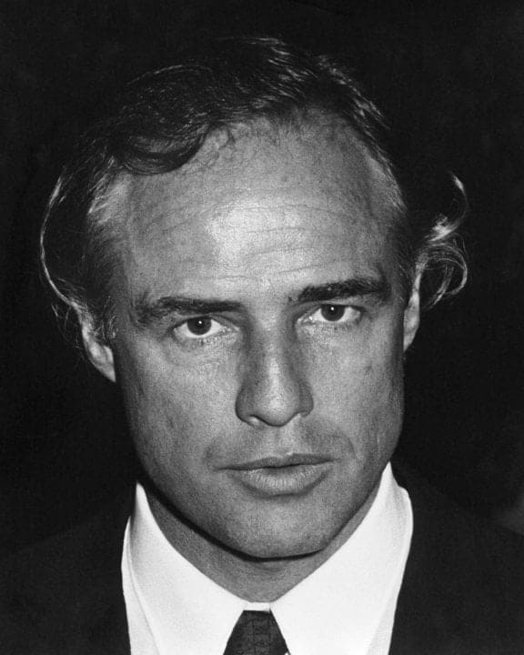 Ron Galella, Marlon Brando attends a SHARE benefit party at the Santa Monica Civic Auditorium, Santa Monica, CA, May 25, 1978