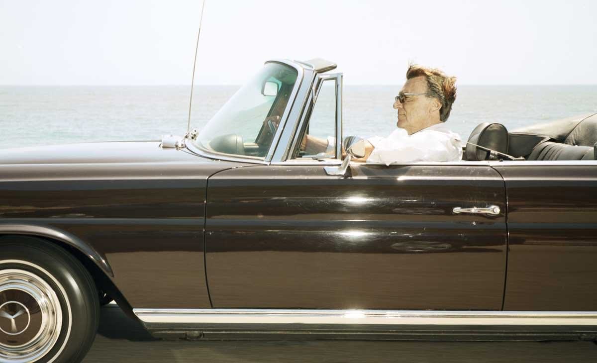 Andrew Bush, Man cruising south-southeast at 65 mph on Highway 101 near Toro Canyon on June 19th as the tide is coming in, 2010