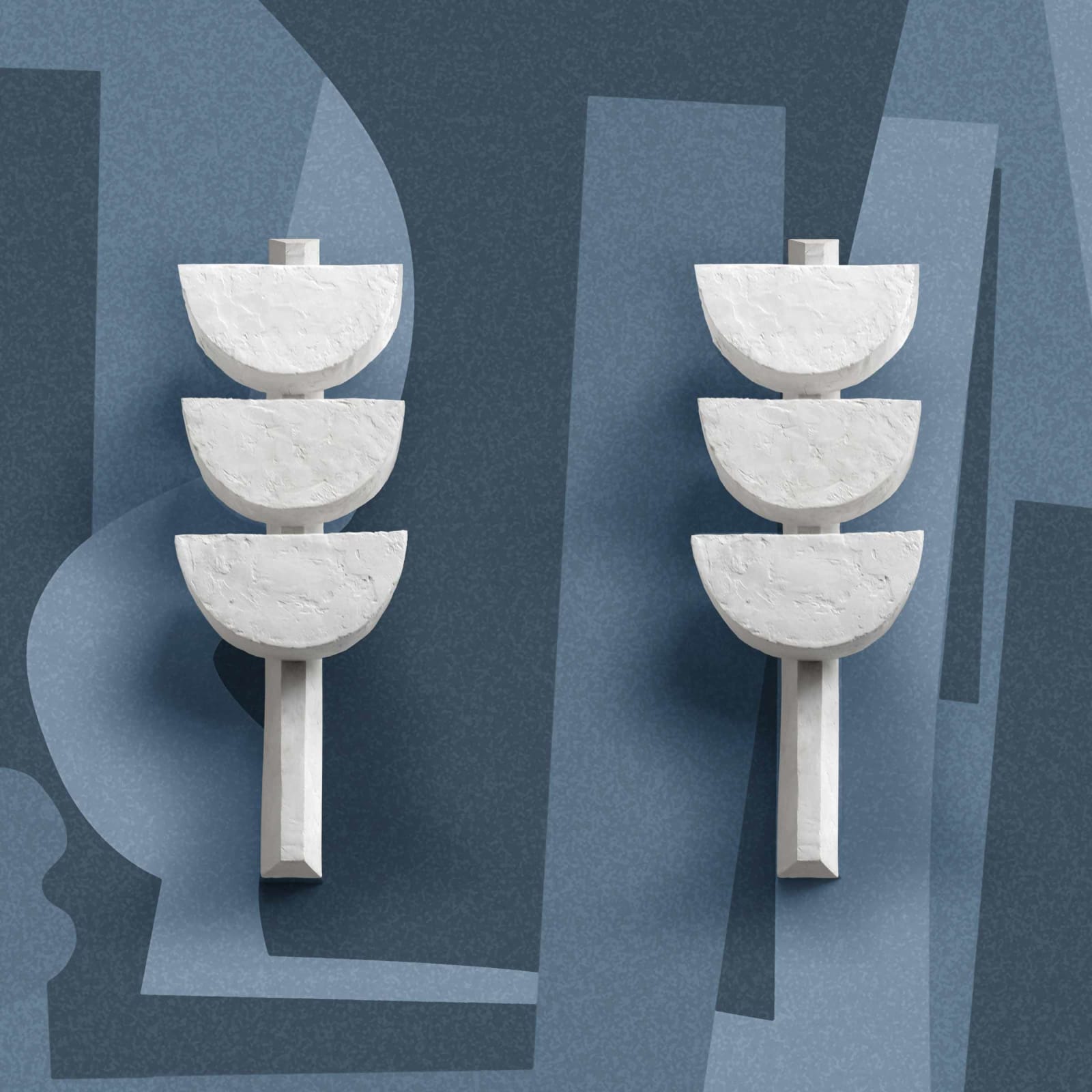 Pair of Newlyn plaster sconces on blue background