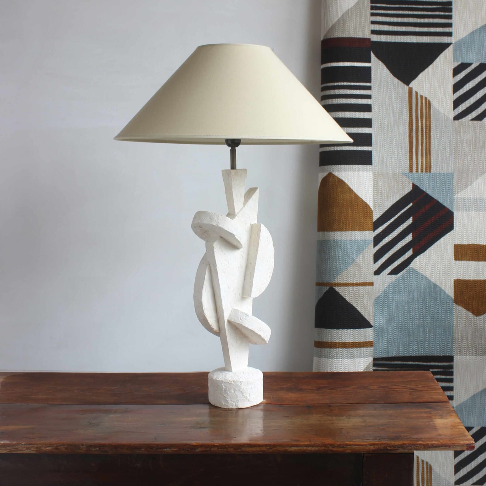 Acobat Lamp on wooden table angled