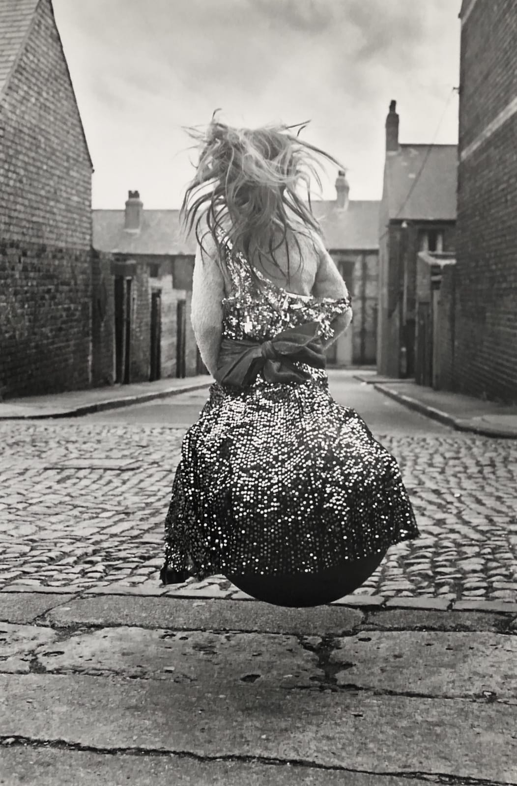 Sirkka-Liisa Konttinen, Girl on a 'Spacehopper', Janet Street Backlane, Byker, 1971