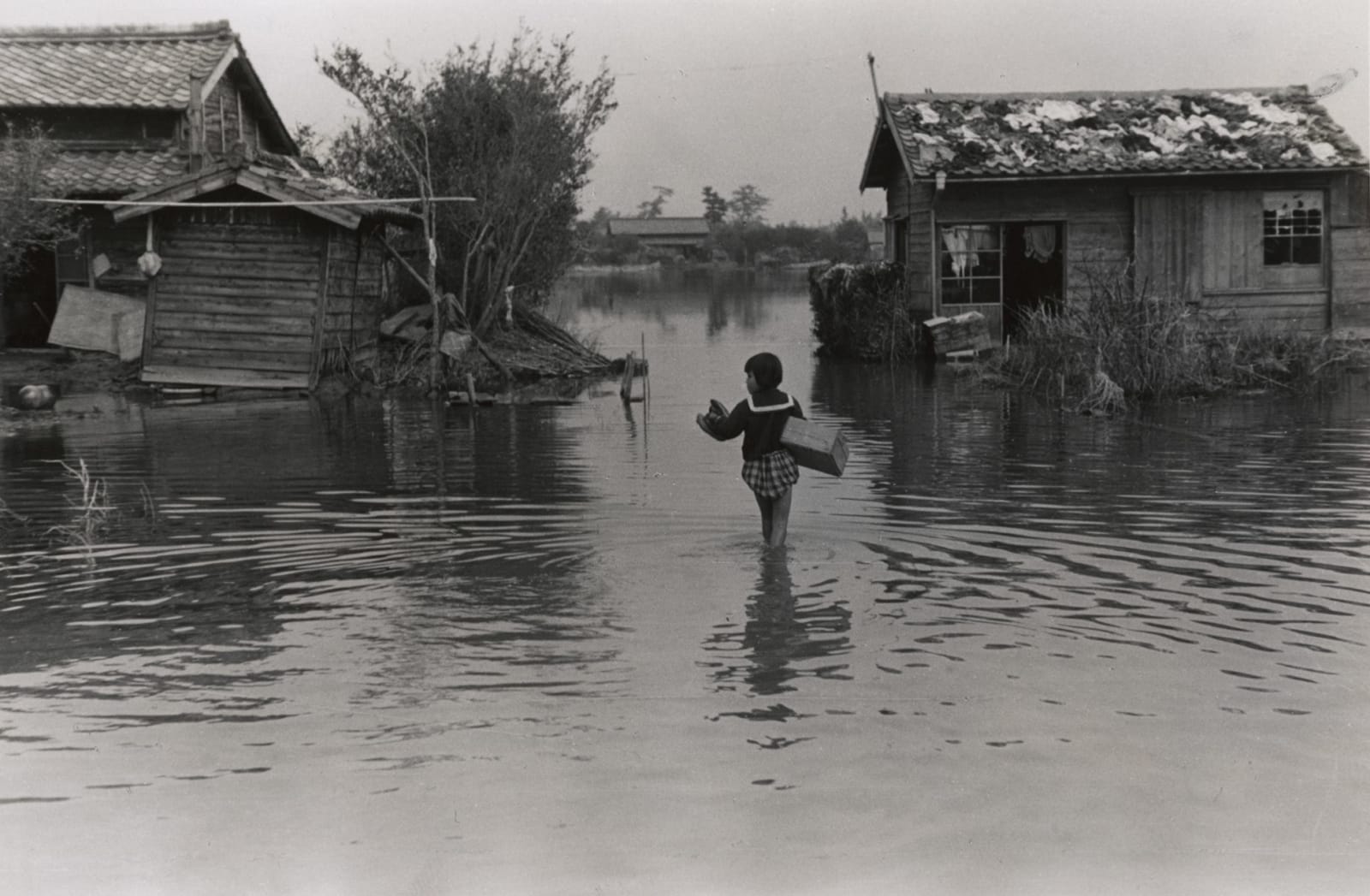 Shomei Tomatsu, On her way back home with box, c. 1955 | Michael