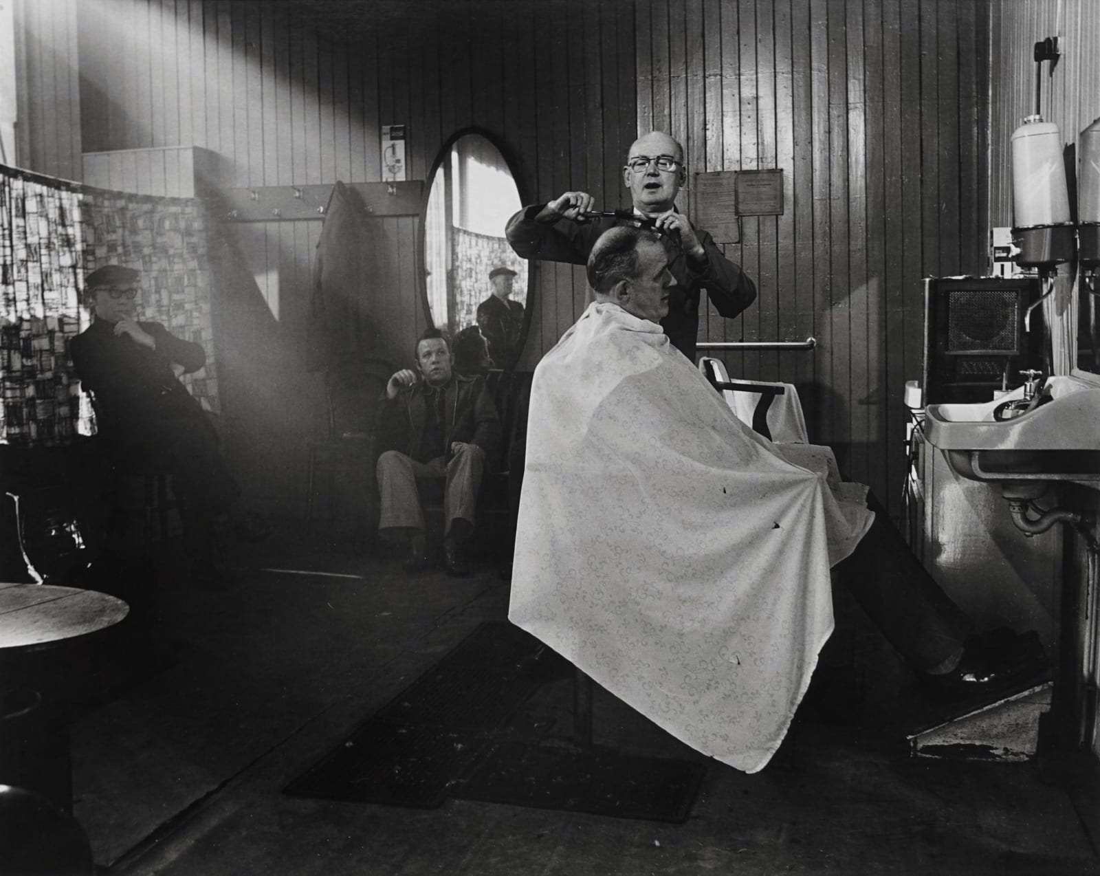 Sirkka-Liisa Konttinen, Mr Douglas at Work, Gents’ Hairdresser in Raby Street, Byker, 1974