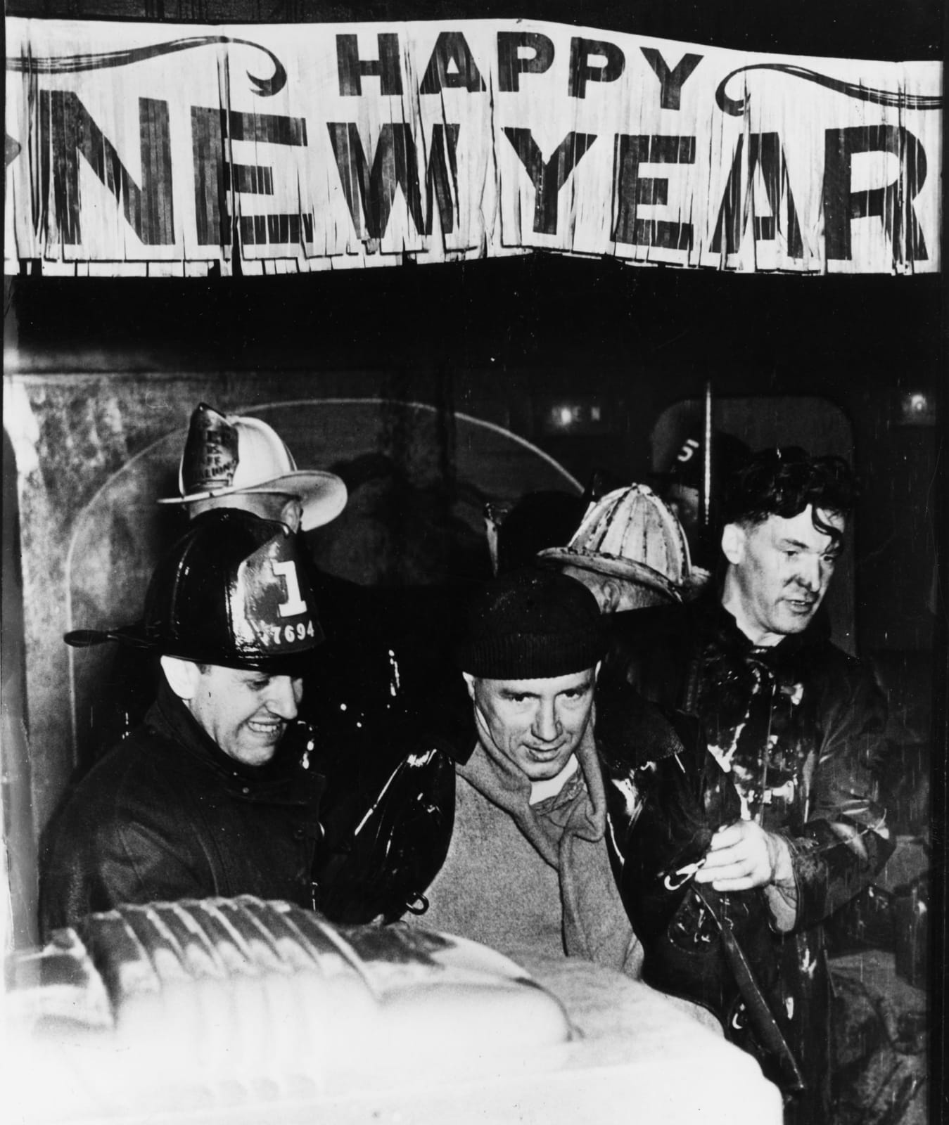 Weegee, ‘Tavern of ground floor of burning building at 80 Greenwich St. is the shelter for firemen overcome by smoke New Years Eve. Customers also had a hot time.”, January 2nd 1945