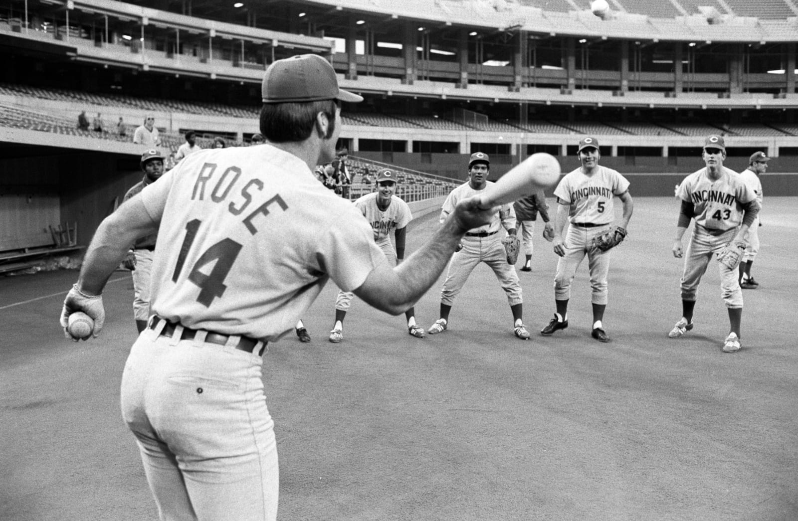 Neil Leifer, Pete Rose of the Cincinnati Reds plays pepper with his teammates before a game versus the Pittsburgh Pirates at Three Rivers Stadium. Pittsburgh, Pennsylvania, 1971