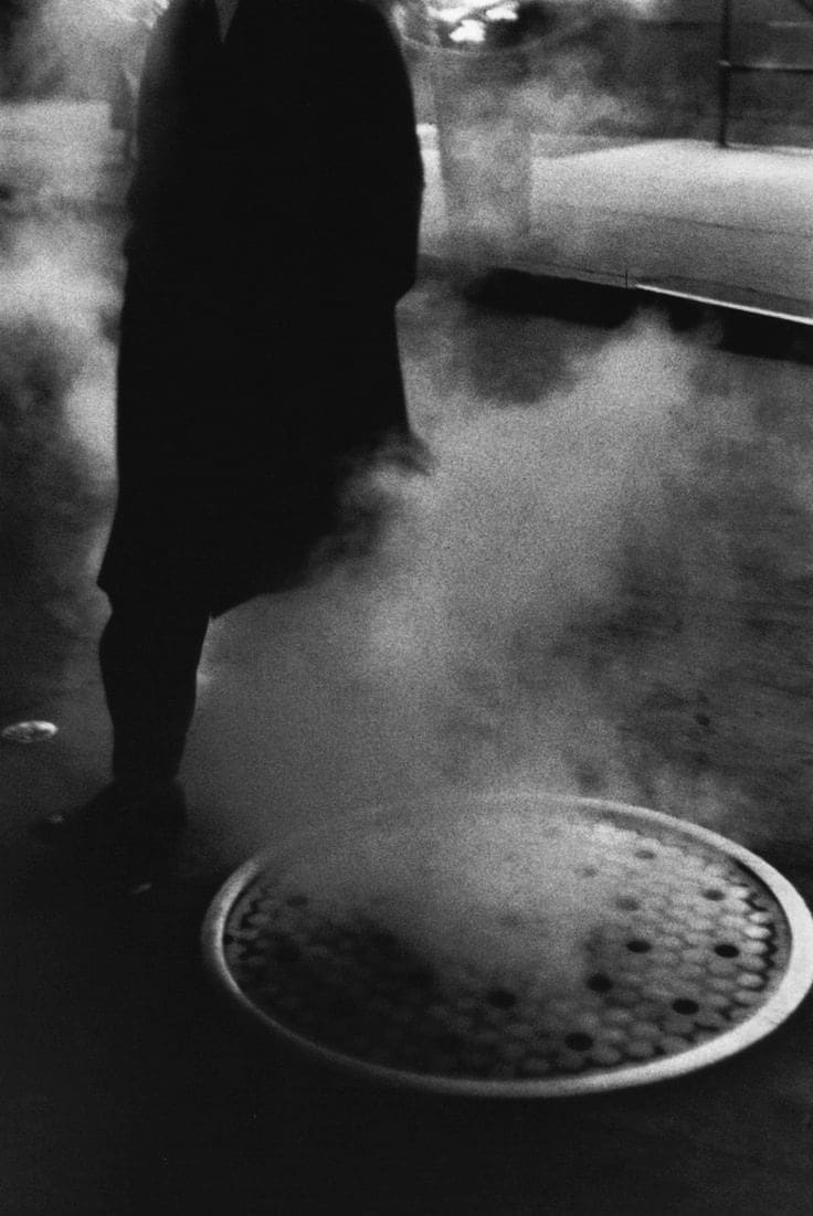 Louis Stettner, Man Near Manhole, Times Square, New York City, 1954