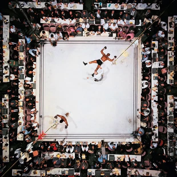 Neil Leifer, Aerial of Muhammad Ali celebrating after his round two knockdown of Cleveland Williams during the 1966 World Heavyweight Title fight at the Astrodome. Houston, Texas, 1966