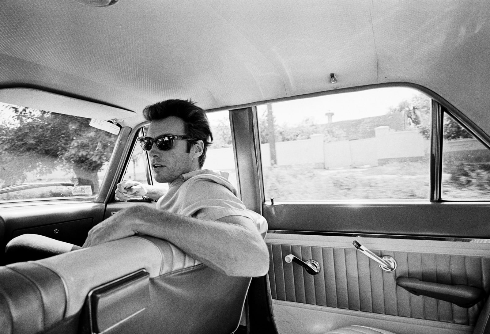 Lawrence Schiller Clint Eastwood Sits In The Front Seat Of A Car While Looking Into The 2274