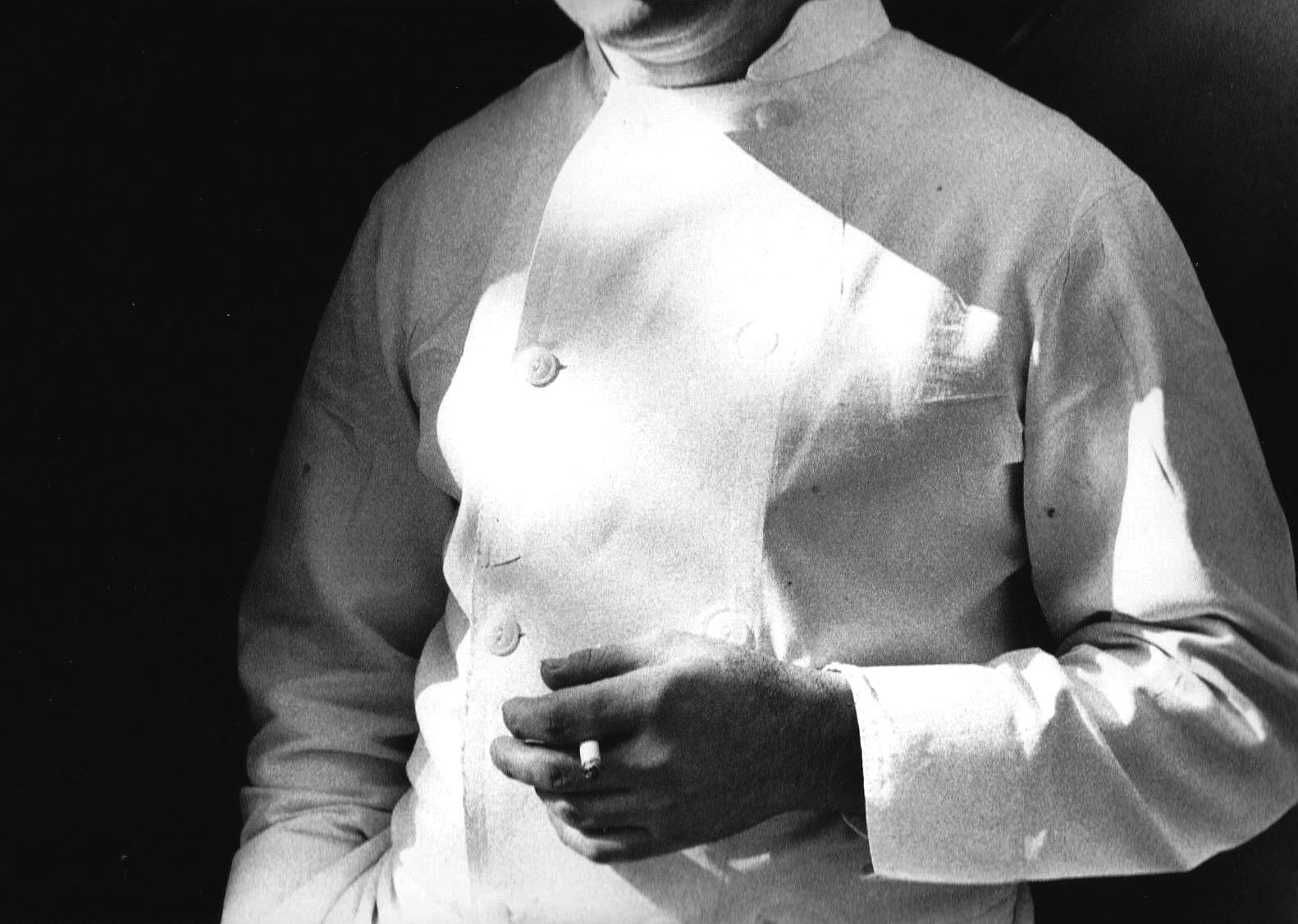 Ralph Gibson, Untitled (Smoking Chef), c. 1975