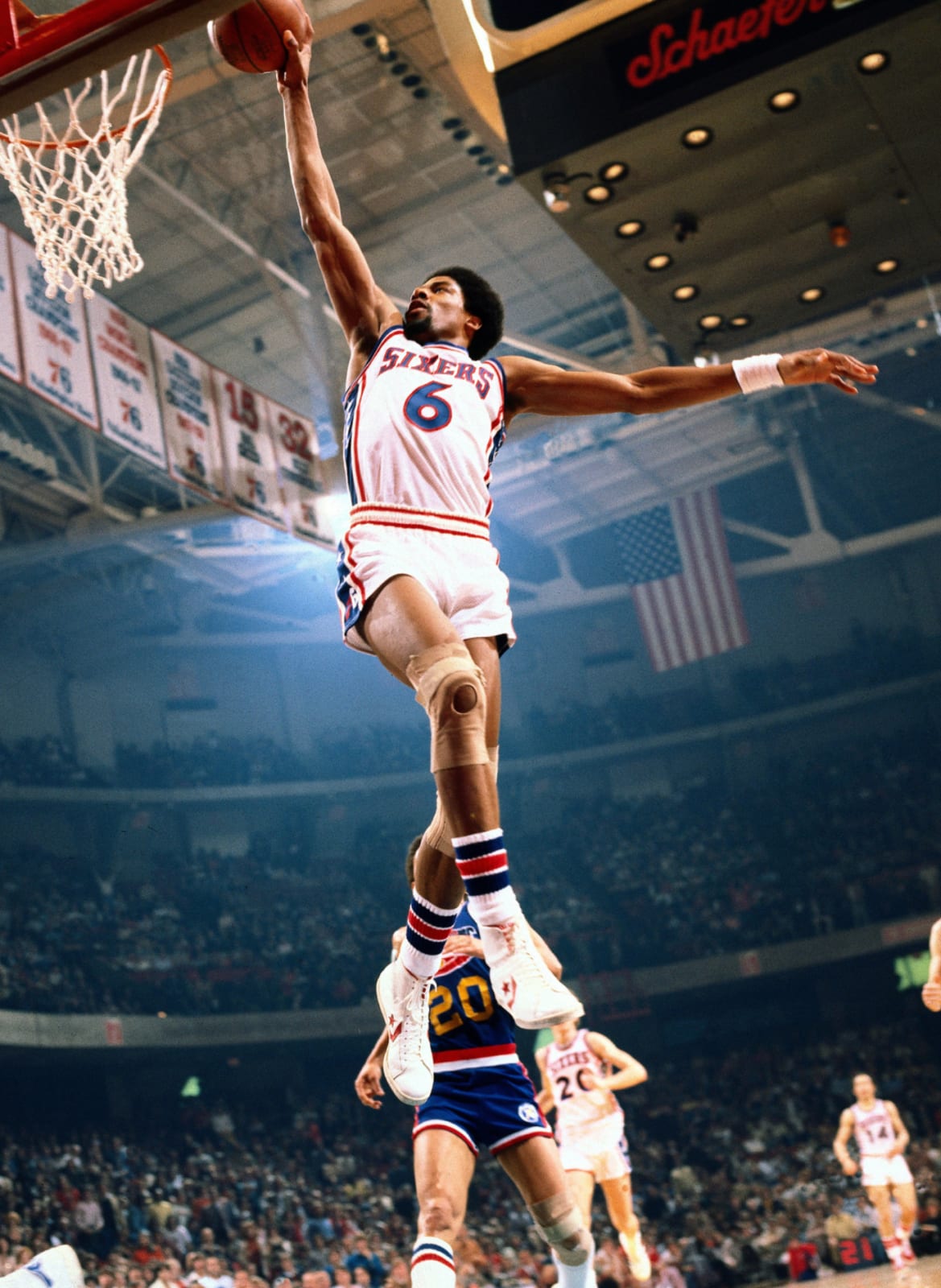Neil Leifer, Philadelphia 76ers forward Julius Dr. J Erving dunks against the Denver Nuggets at The Spectrum, 1977