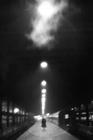Louis Stettner, Woman on Empty Platform, Penn Station, 1958