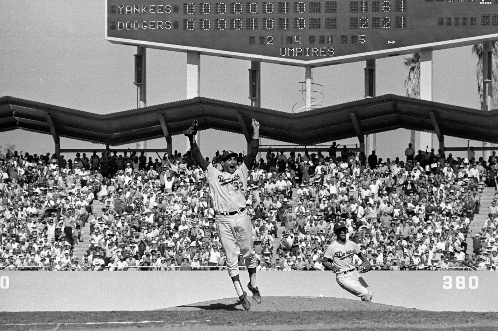 Neil Leifer, Los Angeles Dodgers pitcher Sandy Koufax exalts on the mound after winning Game 4 and the 1963 World Series versus the New York Yankees at Dodger Stadium. Los Angeles, California, 1963