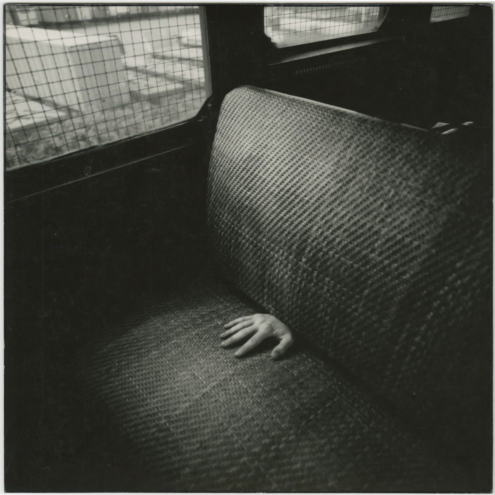 Arthur Tress, Hand on Train Seat, Staten Island, NY, 1971
