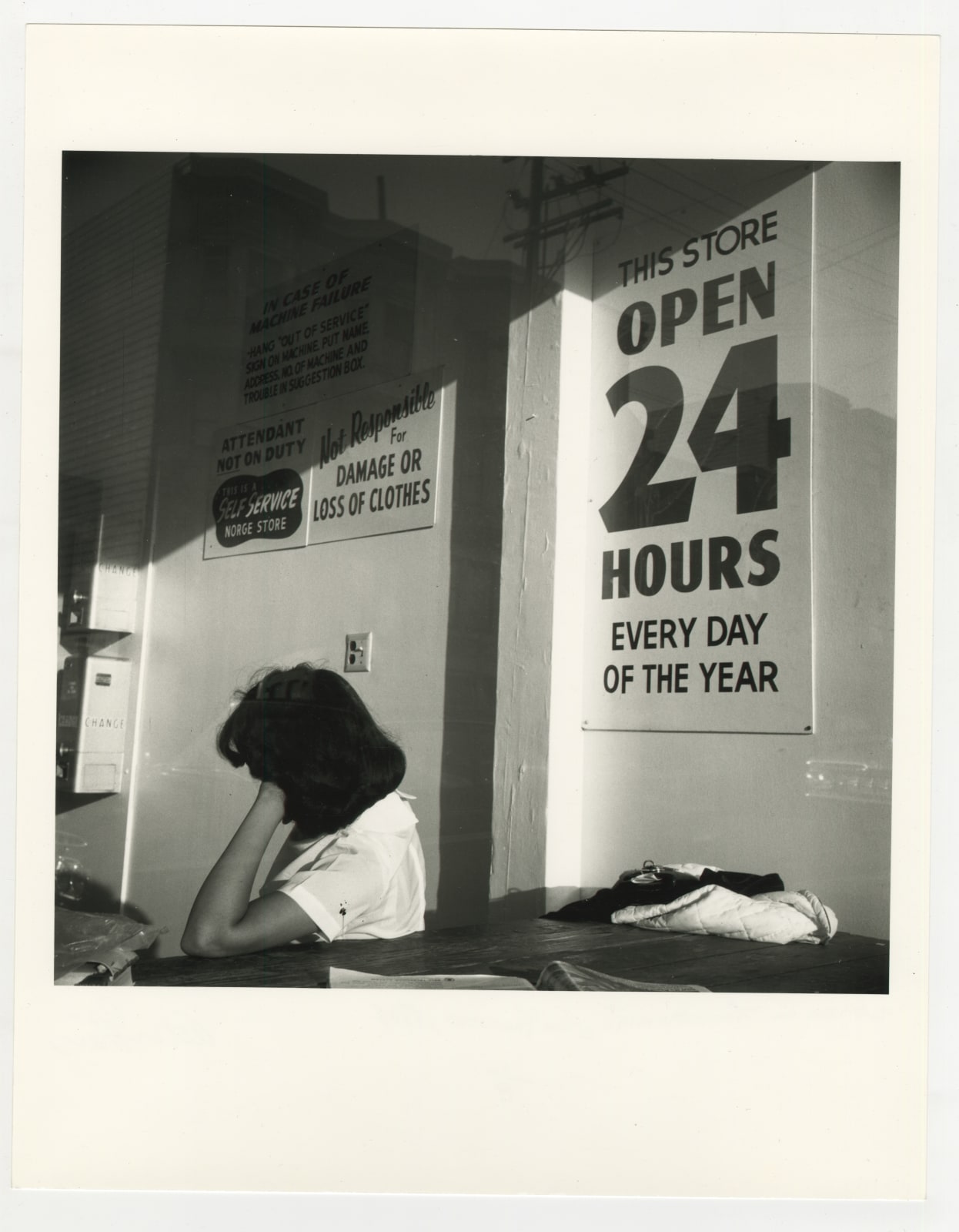 Arthur Tress, Woman in Laundromat, San Francisco, 1964
