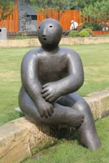 Joy Brown, Sitter on Bench, bronze sculpture 2016