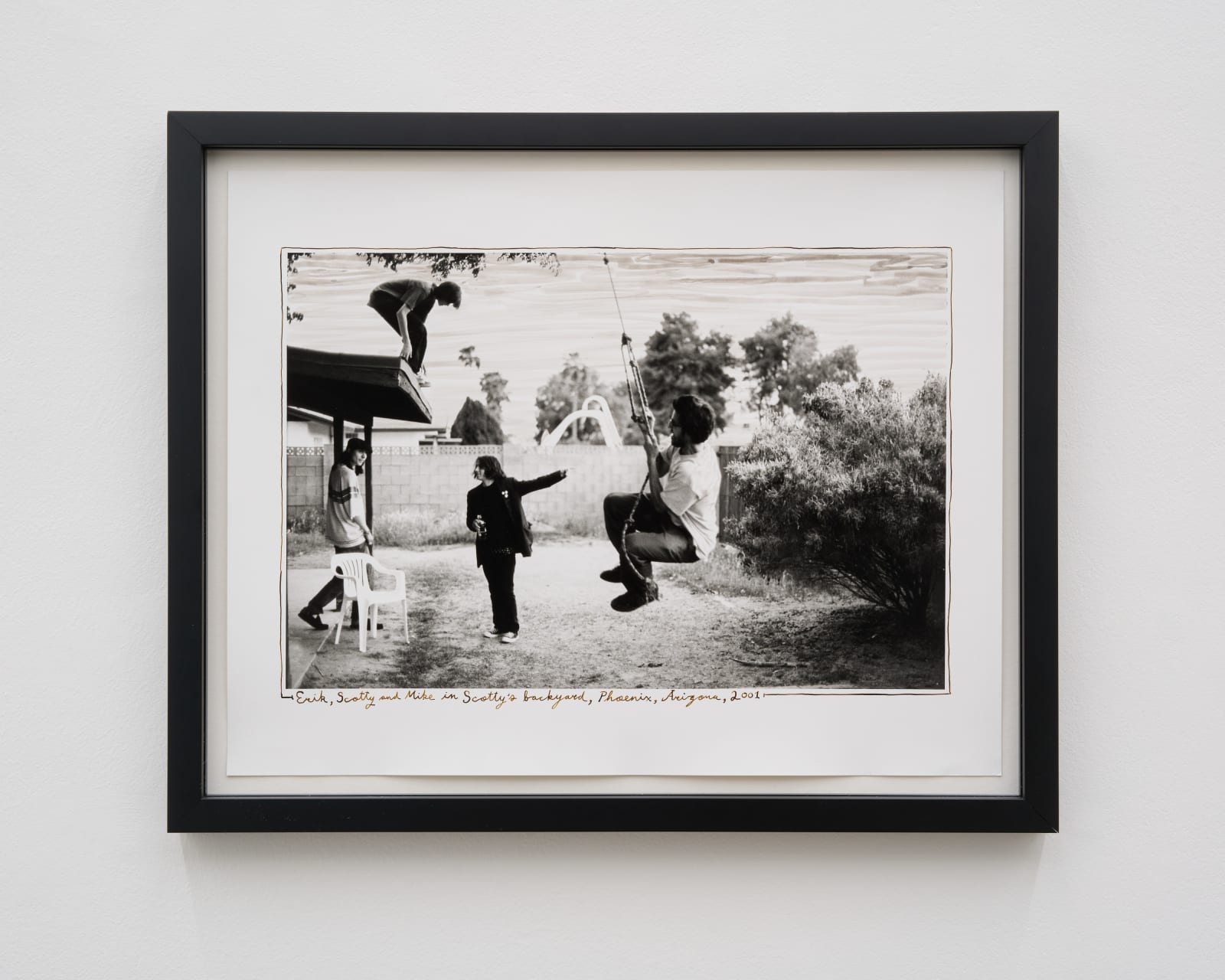 Ed Templeton, Mike Manzoori swings in Scotty’s backyard, Pheonix, Arizona, 2001