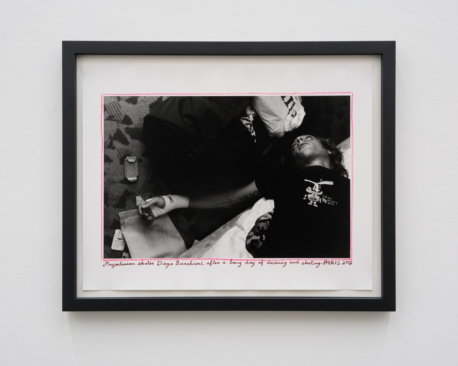 Ed Templeton, Diego Bucchieri relaxes in hotel, Paris, France, 2002