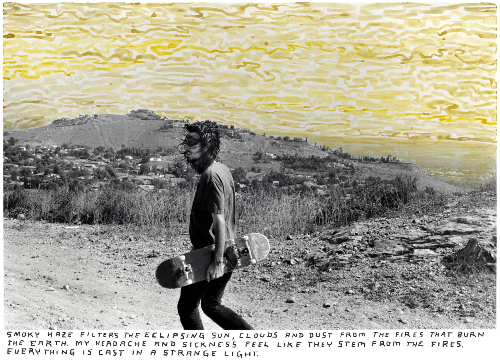 Ed Templeton, Matt Bennett hikes to a drainage ditch, California, 2006