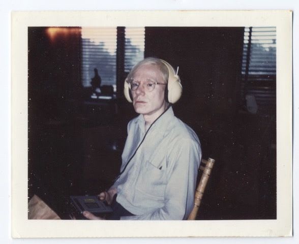 Brigid Berlin, Untitled (Andy Warhol wearing Lou Reed’s headphones), ca. 1973