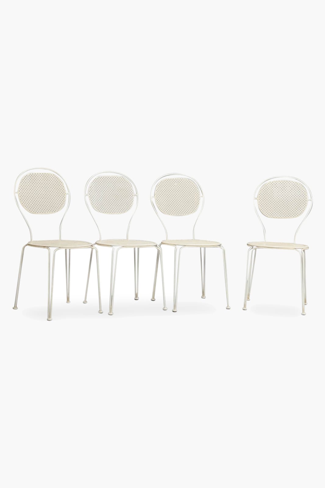 Four Pierced Metal Chairs in the style of Mathieu Matégot