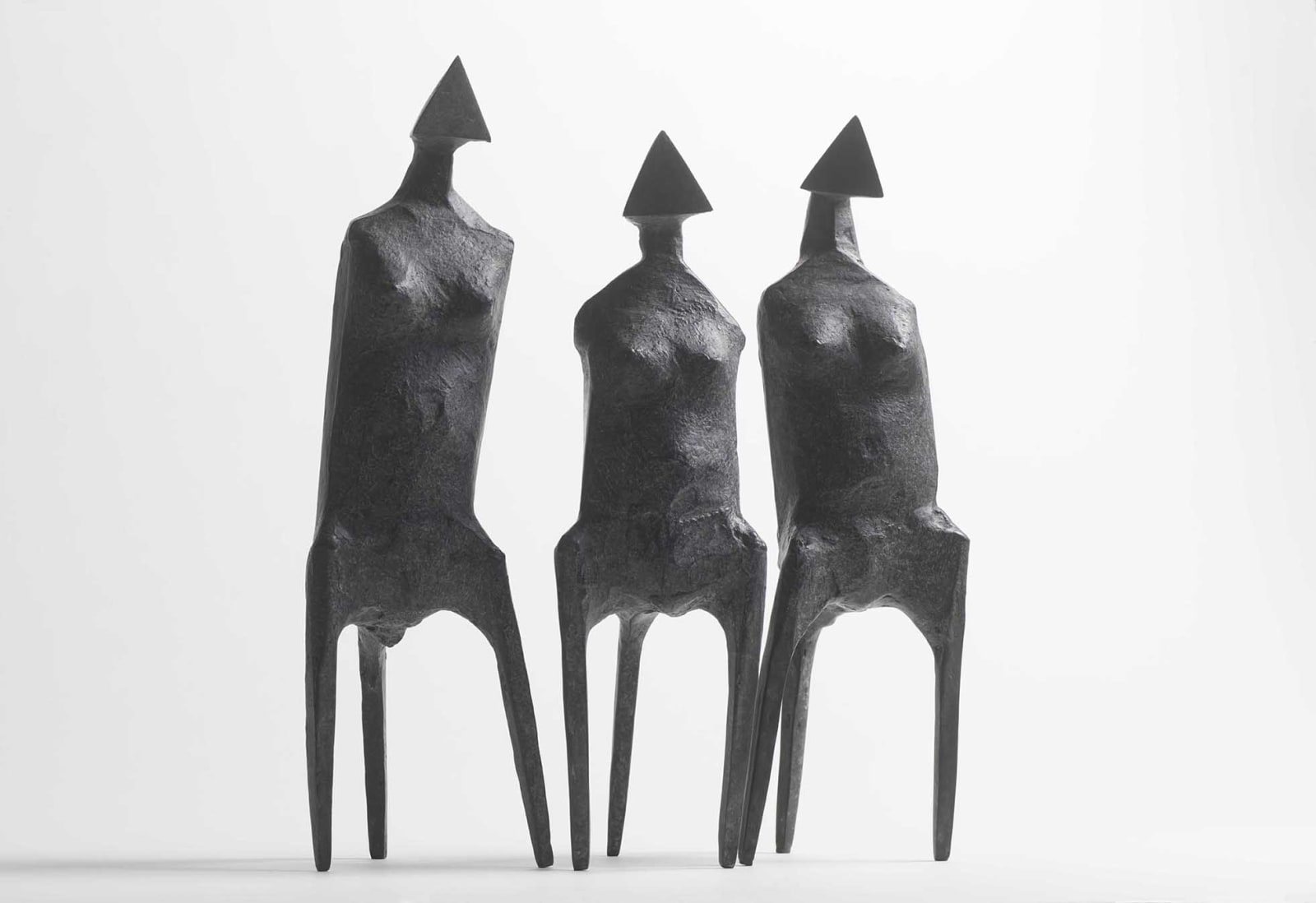 Lynn Chadwick, Three Standing Figures (C67), 1987