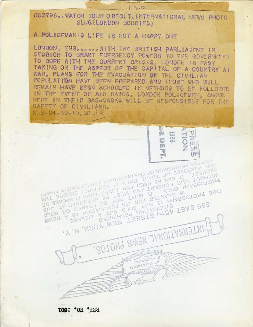 International News Photo, “London Prepares for the Unthinkable: Gas-Masked Policemen on the Eve of War”, 1939., 1939