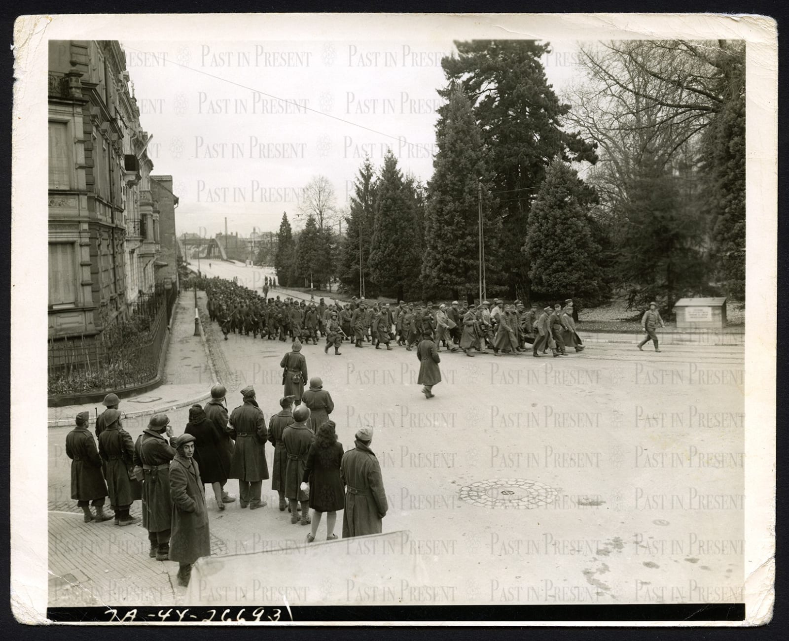 James J Rooney, German prisoners part of the captured garrison taken by the 1st French Armored Division in Mulhouse France 11.22.1944, 1944