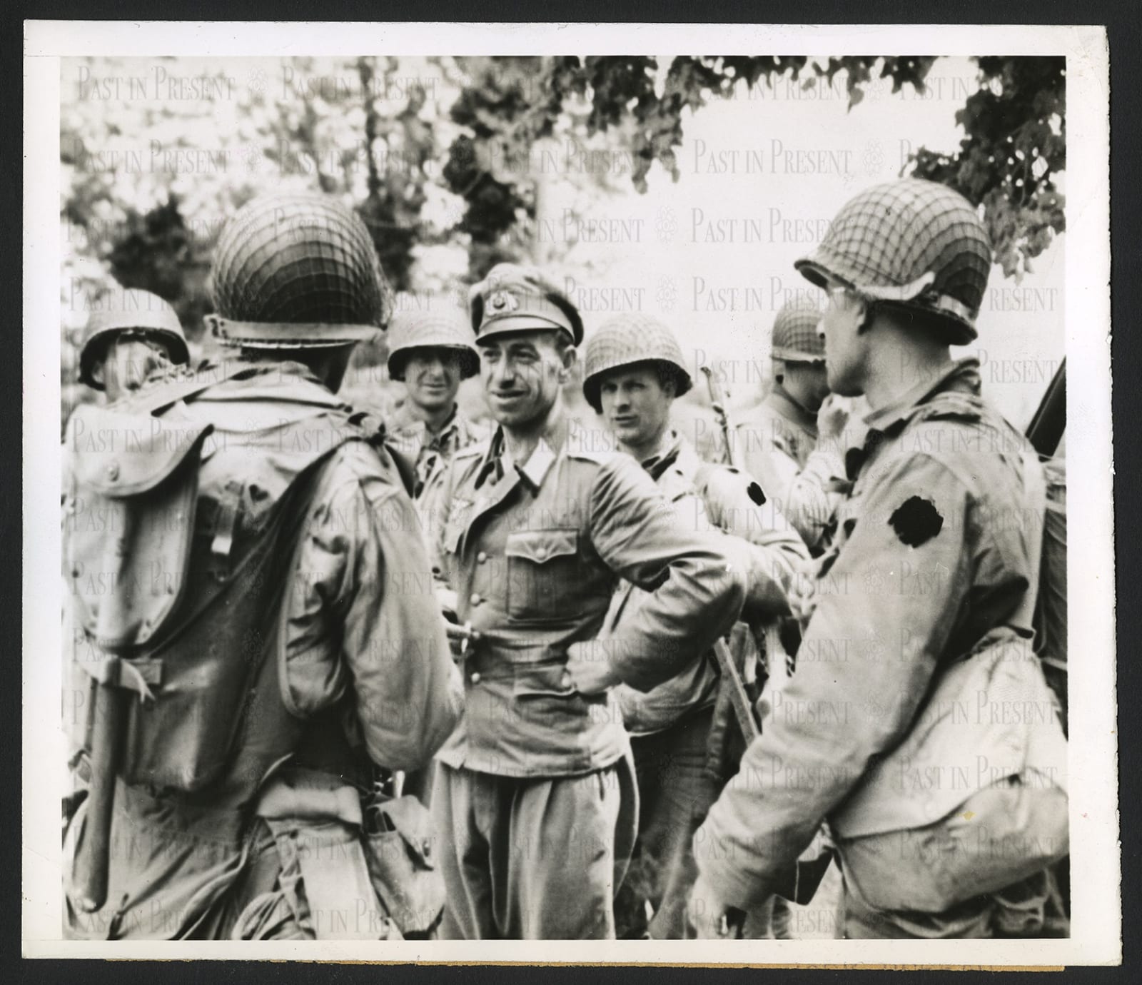 WWII U.S. Soldiers Question Captured German Officer in Normandy, France 6.12.44, 1944