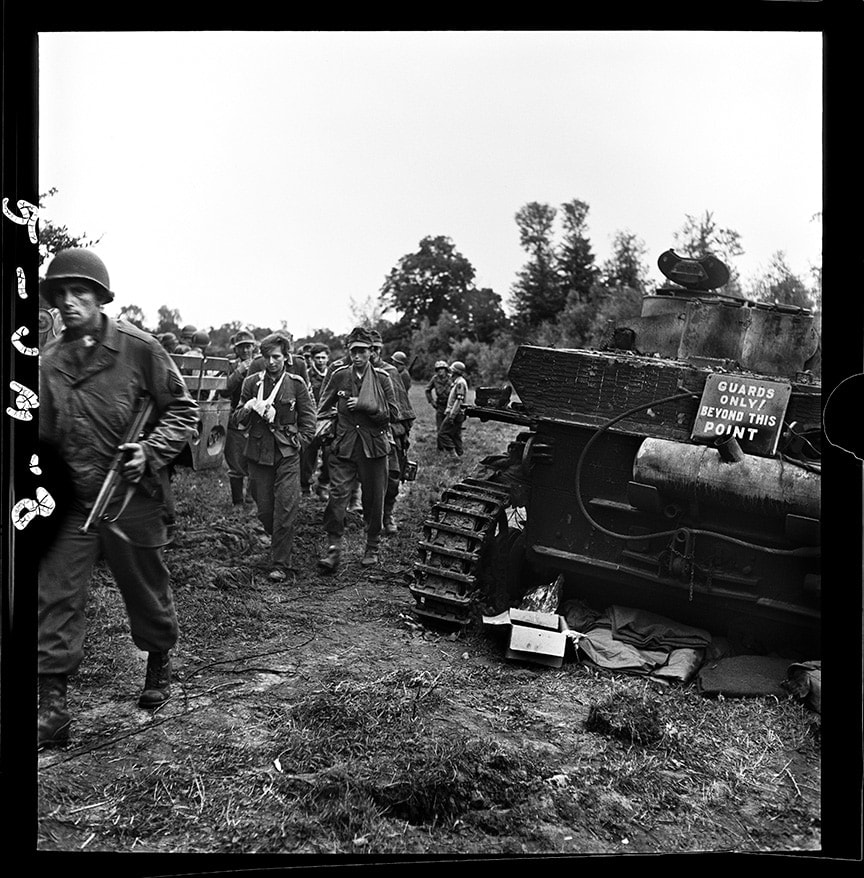 John G. Morris, #5 Near Saint-Lô, Manche, Normandy, July 27: Rangers of the 2nd US Battalion escort German parachutists taken prisoner during operation ‘Cobra’