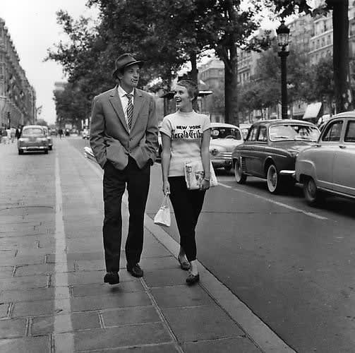 Raymond Cauchetier, Jean-Paul Belmondo and Jean Seberg off-set on the Champs Elysees "À Bout De Souffle", 1959