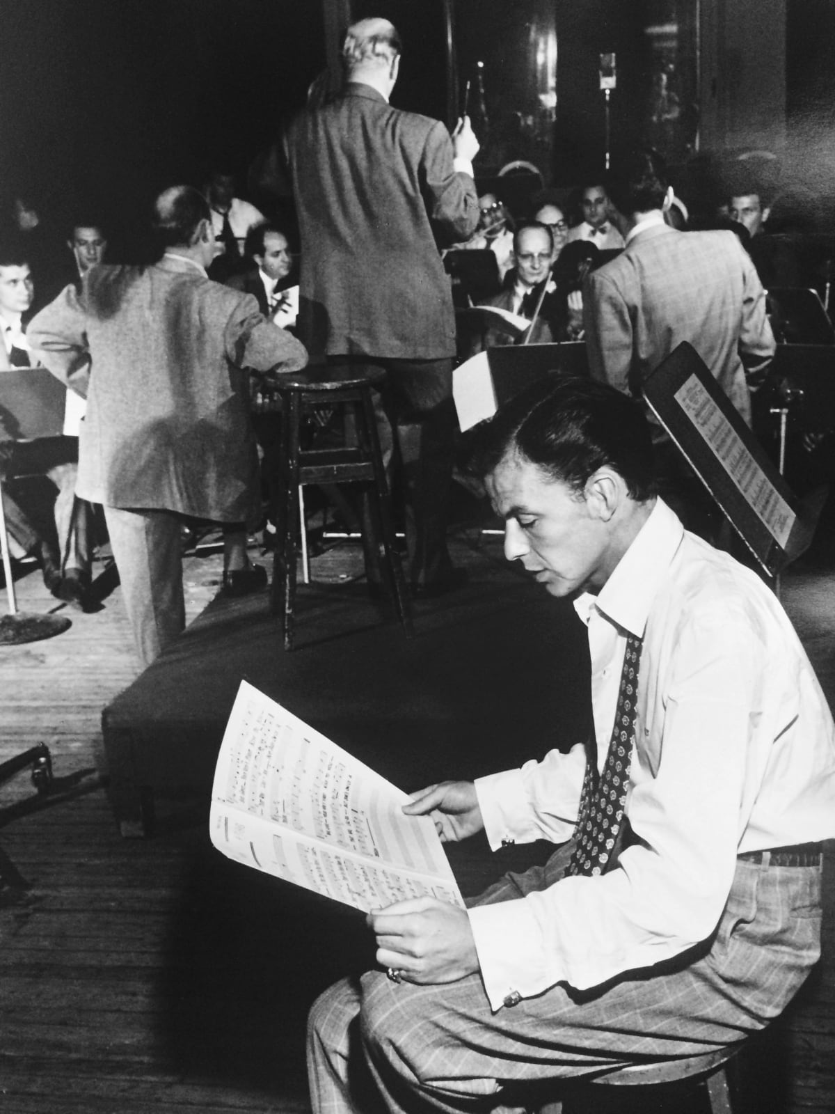 William Gottlieb, Frank Sinatra Seated, Reading Music, 1947