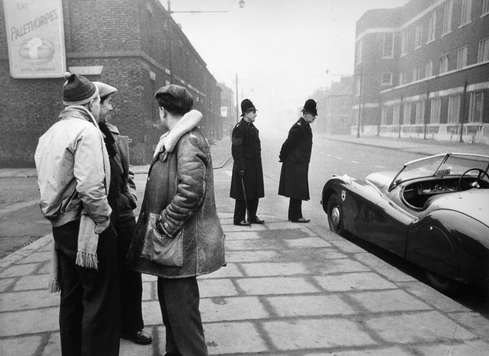 Thurston Hopkins, Wottingham Students & Curious Policeman, c. 1950