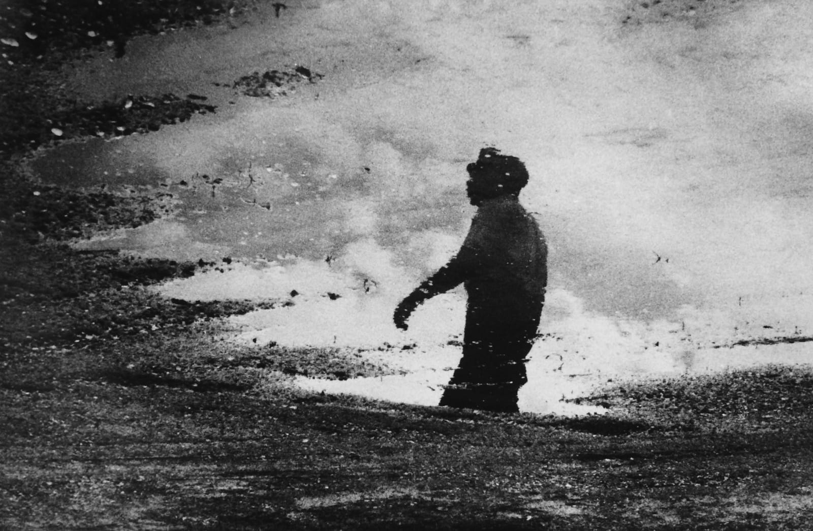 Dan Budnik, Selma to Montgomery March, Martin Luther King, JR. Reflected in a Rain Puddle, Montgomery County, Alabama, March 24th, 1965 / Printed 2015