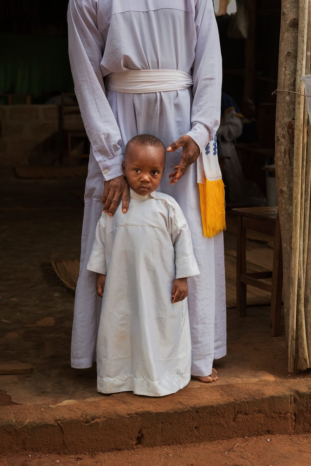 Steve McCurry, Father and son at the entrance to their church