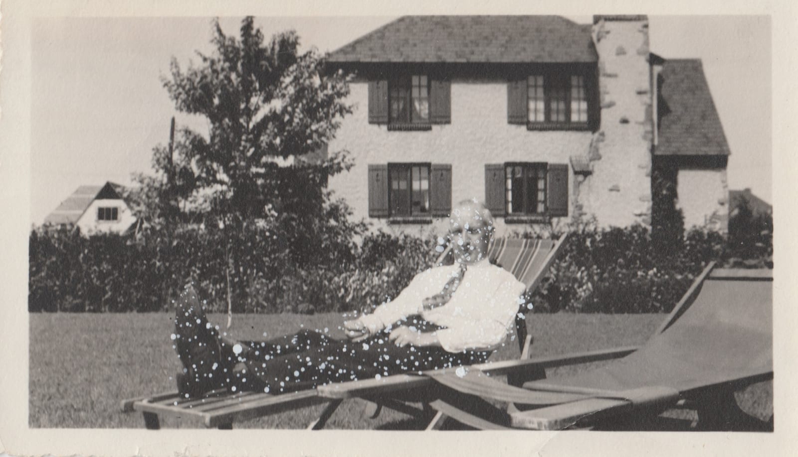 John Latour, Older Man with Buttoned-Up White Shirt and Tie Sitting on a Lawn Chair, 2021
