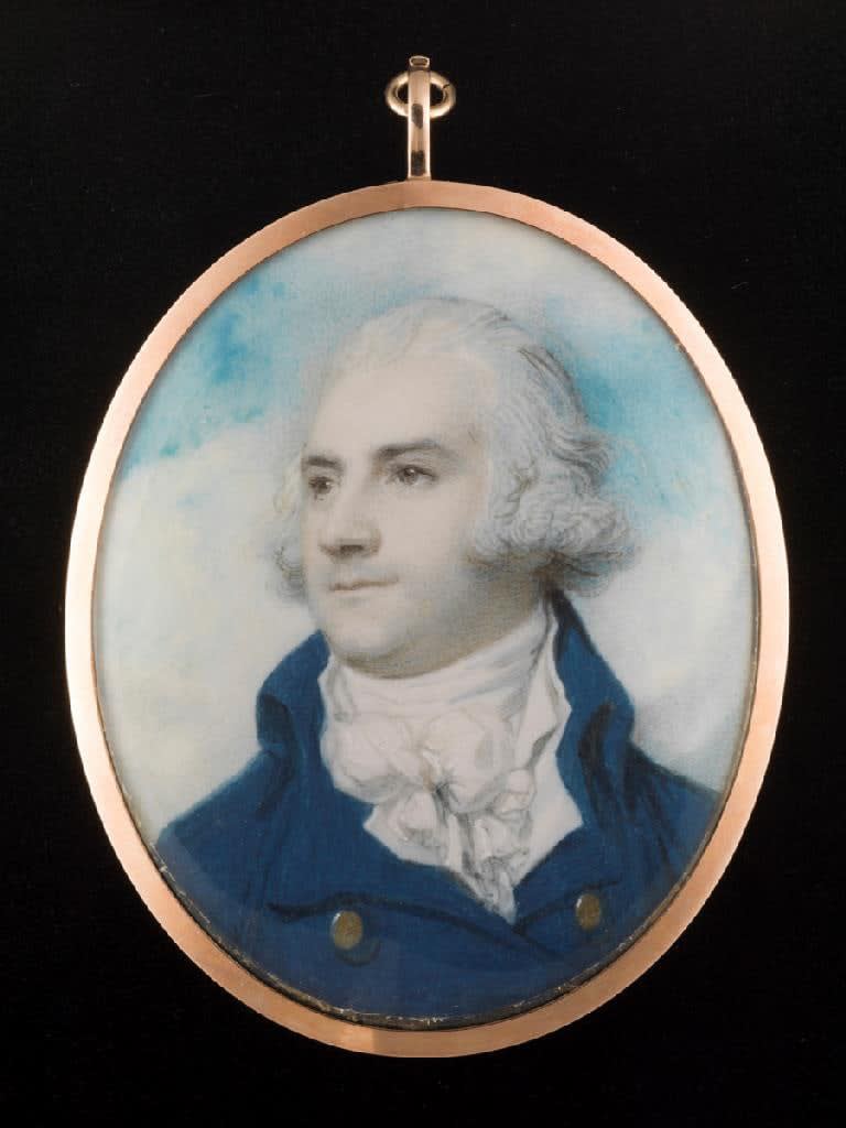 Richard Cosway, Portrait miniature of a Gentleman, wearing blue coat with gold buttons, tied stock and frilled cravat, c. 1790