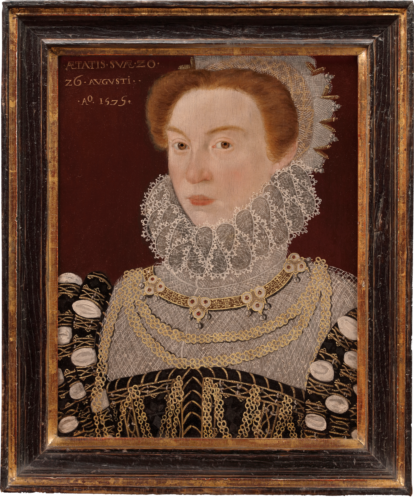 framed tudor portrait of a wealthy lady dressed in white lace ruff and black dress with gold embroidery currently for sale at Philip mould & company