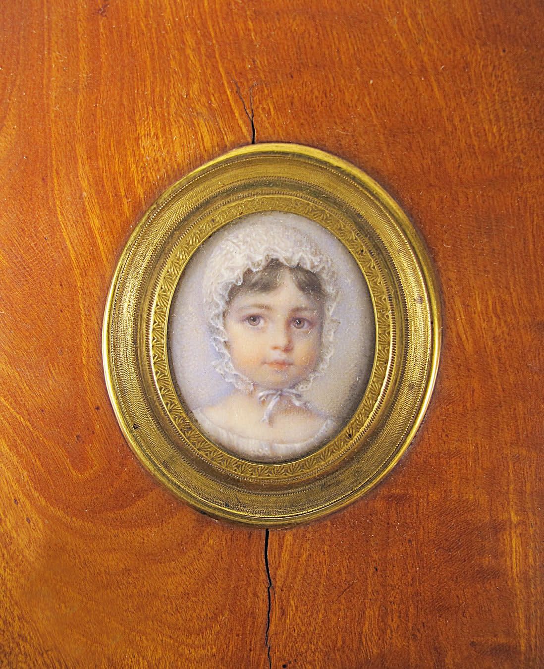 Mlle Marie Marguerite Françoise Jaser, A portrait miniature of a very young Girl of the de Tasserant family (later Madame de L’Dedier), wearing white lace bonnet and dress