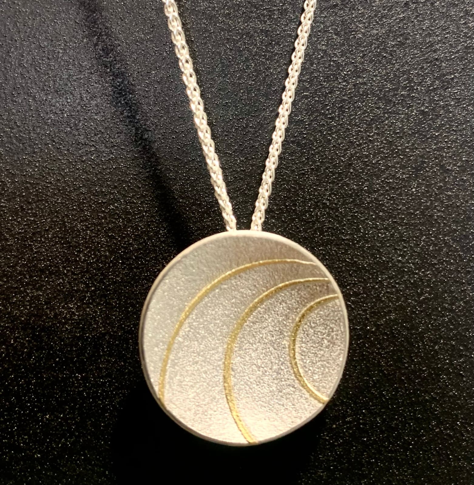 Hannah Souter, Small satin lunar pendant, 2025