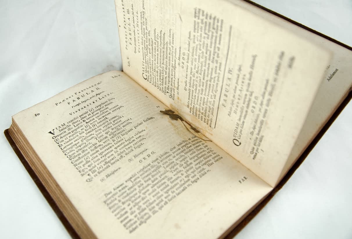 Phaedri Fabulae: or, Phaedrus's Fables. Dried flower laid in