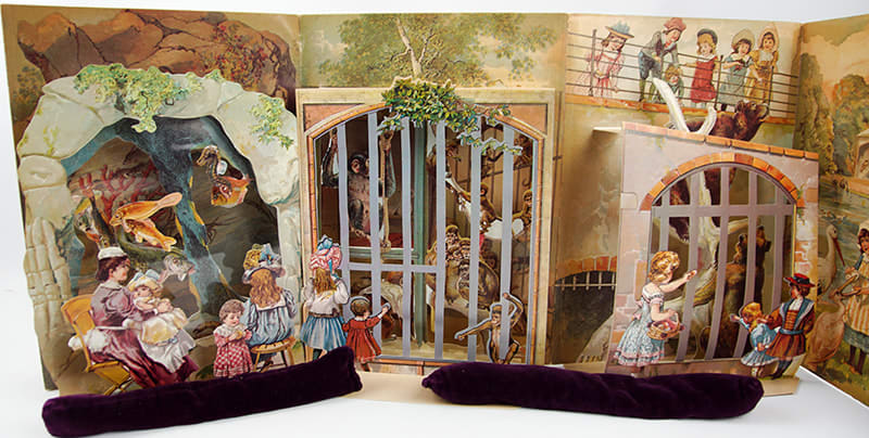 A Day in the Zoo. Realistic Pictures of Birds Beasts and Fishes. A Reproduction of an Antique Pop-up Book. Pop-up of snakes and monkeys in cages.