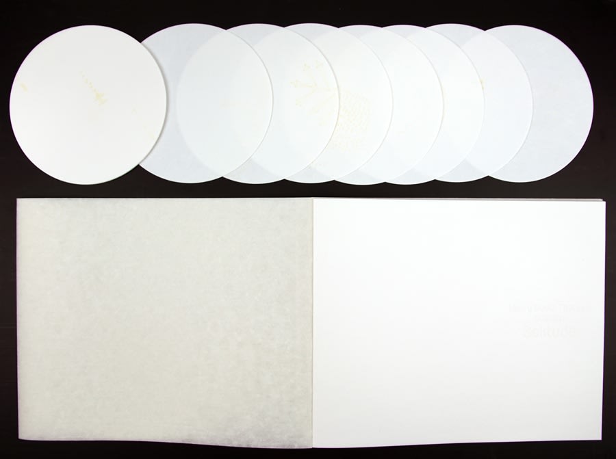 Solitude by Veronika Schäpers. Interior page spread and circular pages.