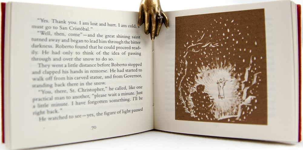 The Saintmaker's Christmas Eve. Illustrated text spread