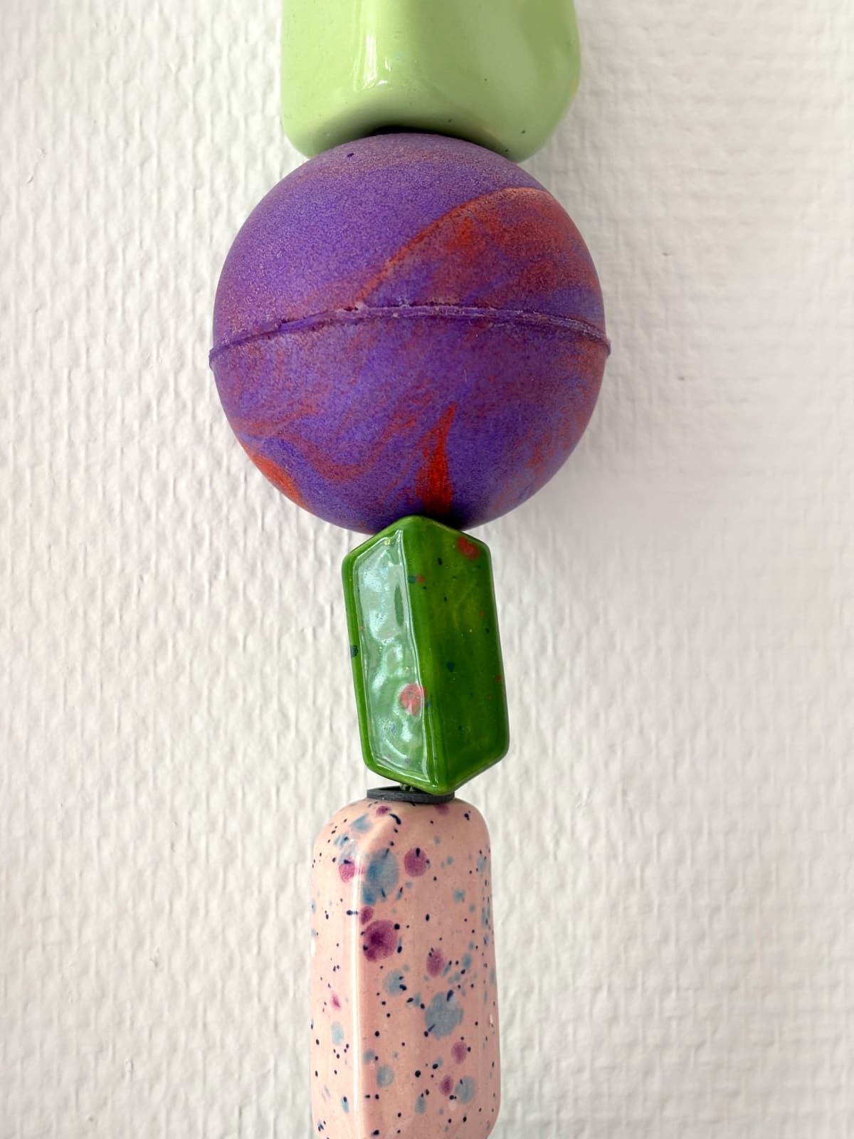 Rinske van den Heuvel, Adornment in green and purple